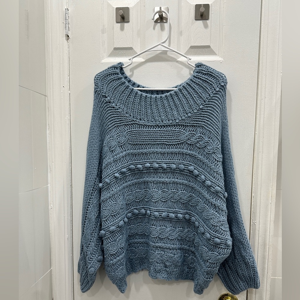 Blue knitted sweater